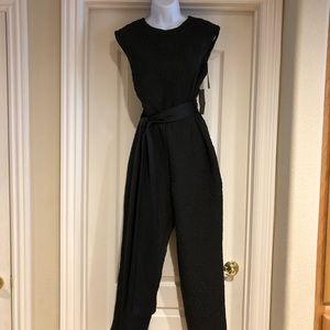 Size 10 Black With rose imprint jumpsuit! New York and Company!